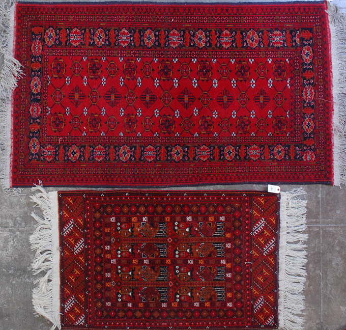 Appraisal: TWO AFGHAN BELOUCHI TRIBAL AREA RUGS ' X ' and