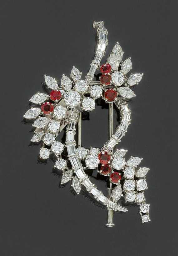 Appraisal: RUBY AND DIAMOND CLIP BROOCH ca Platinum Elegant brooch with