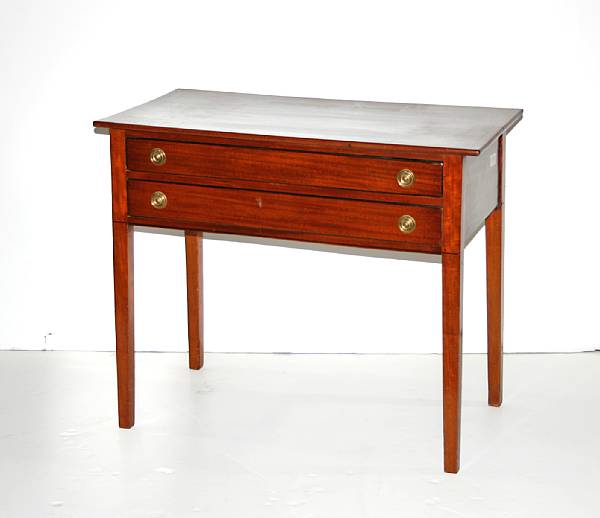 Appraisal: A George III crossbanded mahogany side table