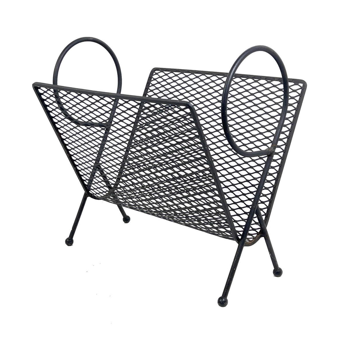 Appraisal: Italian modern Black Metal Magazine Rack Uber stylish with hoop