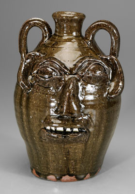 Appraisal: Burlon Craig stoneware face jug Lincoln County North Carolina -