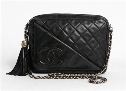 Appraisal: Chanel black quilted leather purse Rectangular top-zip design with signature