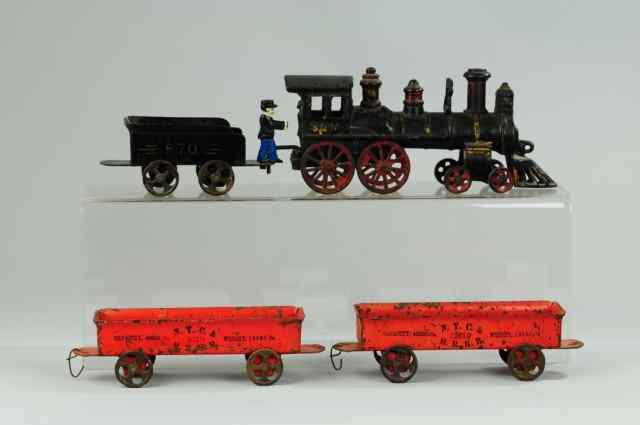 Appraisal: CARPENTER LOCOMOTIVE WITH FREIGHT CARS Lot includes - - cast