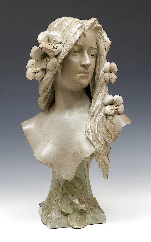 Appraisal: Georges Coudray terra cotta female bust Georges Coudray terra cotta