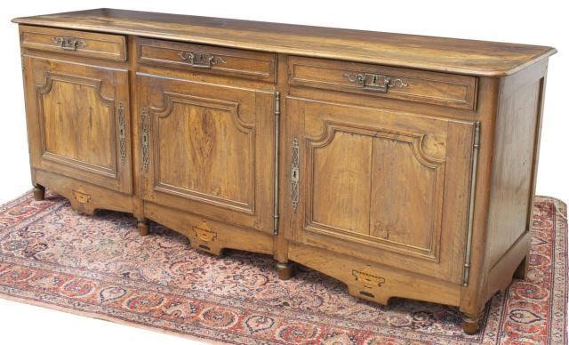 Appraisal: French Provincial walnut sideboard th c long rectangular case fitted