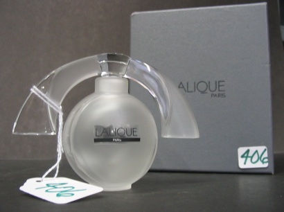 Appraisal: A LALIQUE FROSTED AND CLEAR GLASS PERFUME BOTTLE with formed