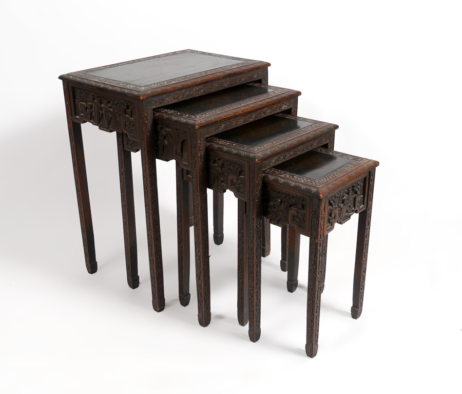 Appraisal: CARVED ORIENTAL NESTING TABLES Nest of tables carved oriental motifs