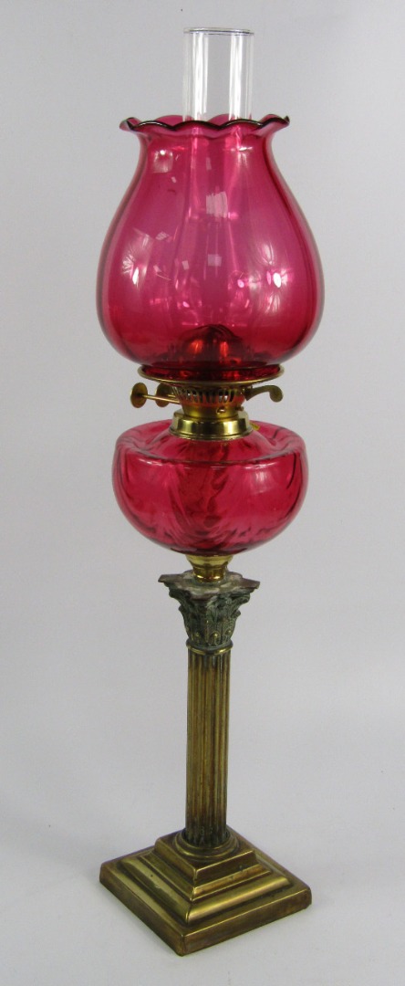 Appraisal: A Duplex brass oil lamp of Corinthian column form early