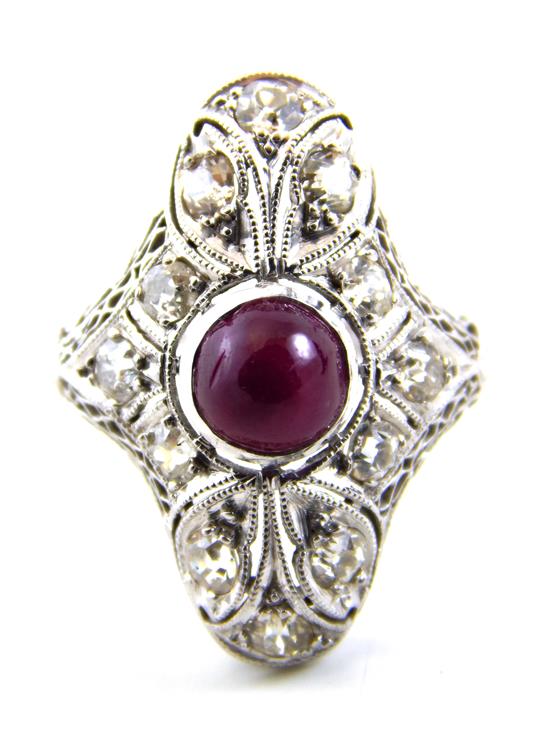 Appraisal: JEWELRY Round ruby and diamond oval-shaped filigree ring stamped and