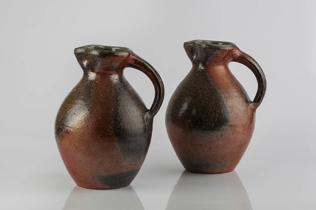 Appraisal: Svend Bayer Danish b Pair of jugsshino glaze with ash