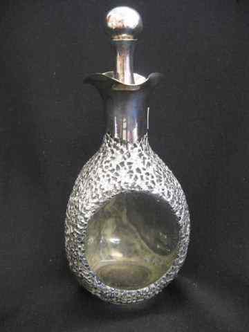 Appraisal: Oriental Sterling Silver Overlay Decanter elaborate flowering vine decor on