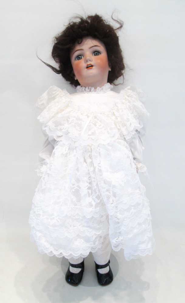 Appraisal: HEINRICH HANDWERCK BISQUE SOCKET HEAD DOLL having brown wig with