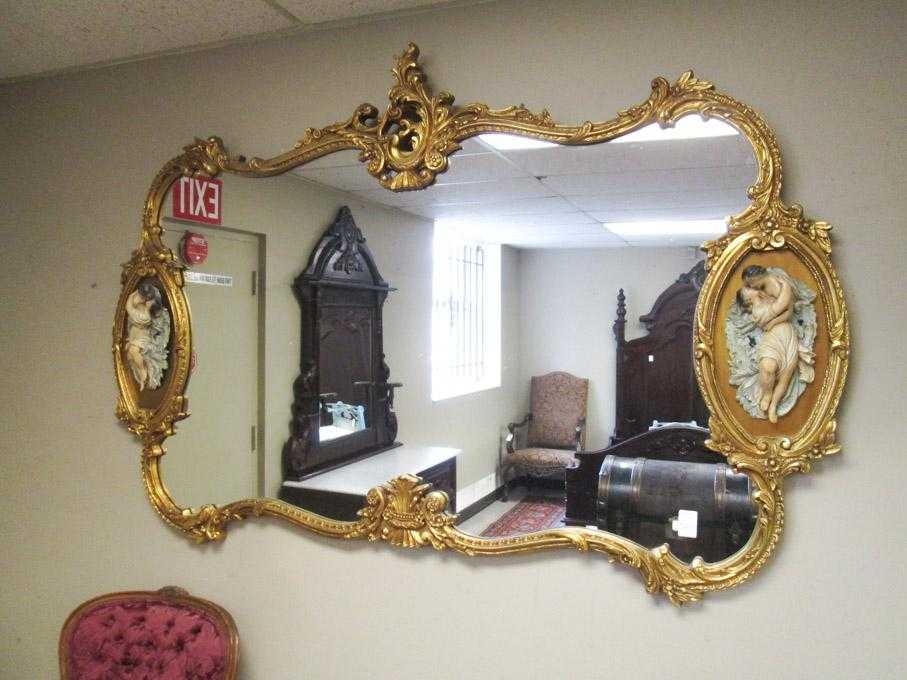 Appraisal: LARGE ROCOCO STYLE WALL MIRROR French Louis XV substyle American