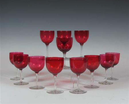 Appraisal: A group of twelve cranberry wine glasses with plain stem