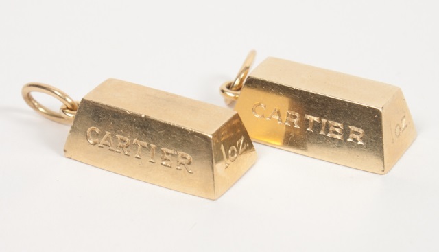 Appraisal: Two Cartier K ingot pendants each ozt plus suspension ring