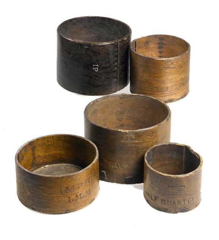 Appraisal: A SET OF THREE GRADUATED STEAM-BENT WOOD CUBIC MEASURES Half