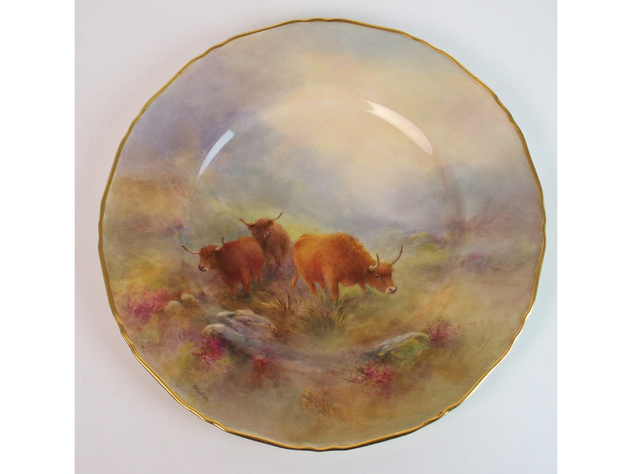 Appraisal: A Royal Worcester plate painted by Stintondepicting three Highland cows