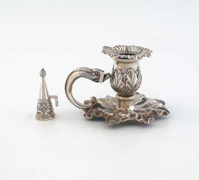 Appraisal: A William IV naturalistic chamberstick on a leafy base with