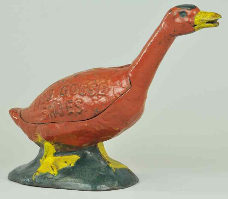 Appraisal: RED GOOSE SHOES STRING HOLDER full figure cast iron painted