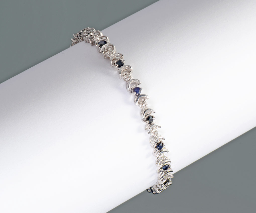 Appraisal: SAPPHIRE DIAMOND BRACELET K white gold bracelet contains round faceted