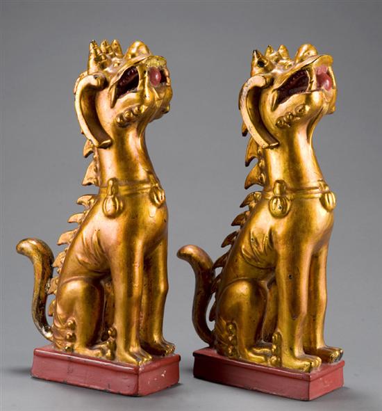 Appraisal: Pair of Vietnamese gilded wood foo lions c s Pair