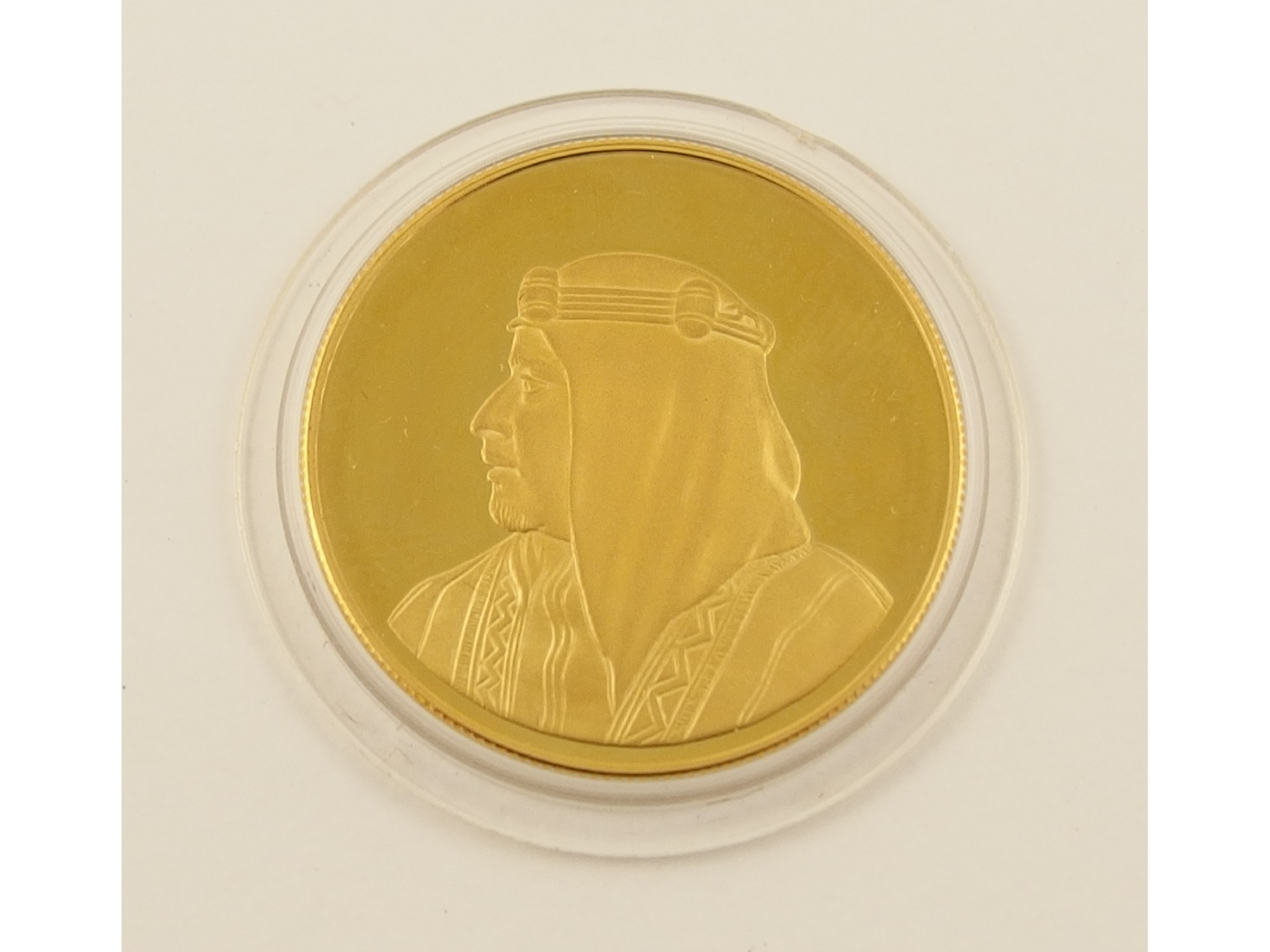 Appraisal: A Bahrain ct gold medallion to commemorate Hamad Town -