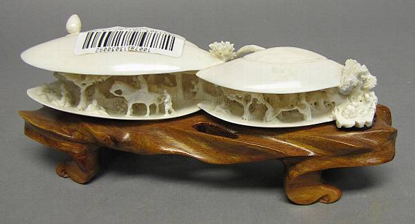 Appraisal: Ivory and Bone Carvings th Century now adhered to wood