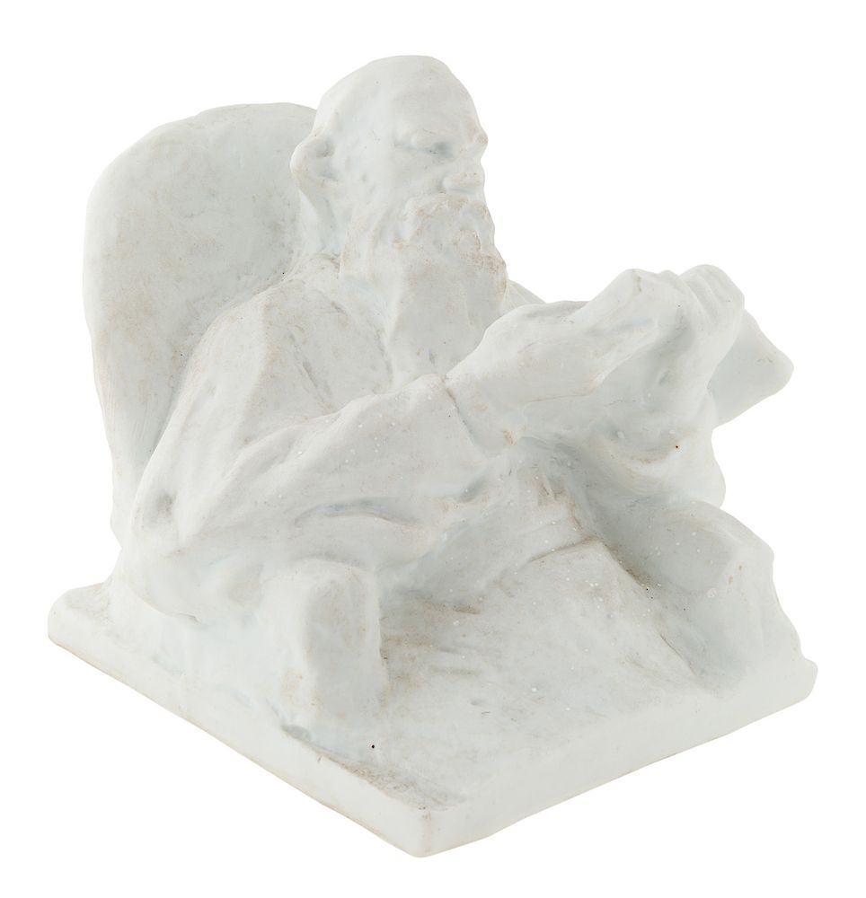 Appraisal: A SOVIET PORCELAIN FIGURE OF 'LEO TOLSTOY READING' AFTER ILYA