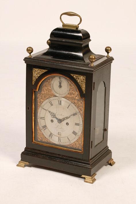 Appraisal: A GEORGE III BRACKET CLOCK in ebonised case the silvered