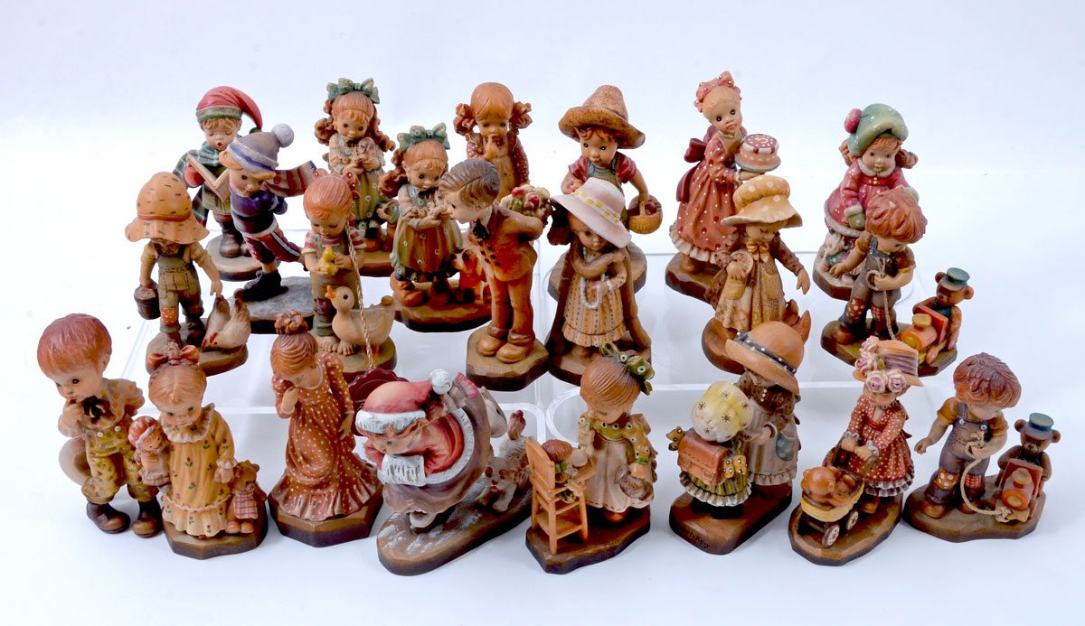 Appraisal: SARAH KAY ANRI ITALIAN CARVED WOOD FIGURINES An assembled collection