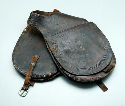 Appraisal: Leather pommel type saddlebag leather with tooled floral decoration one