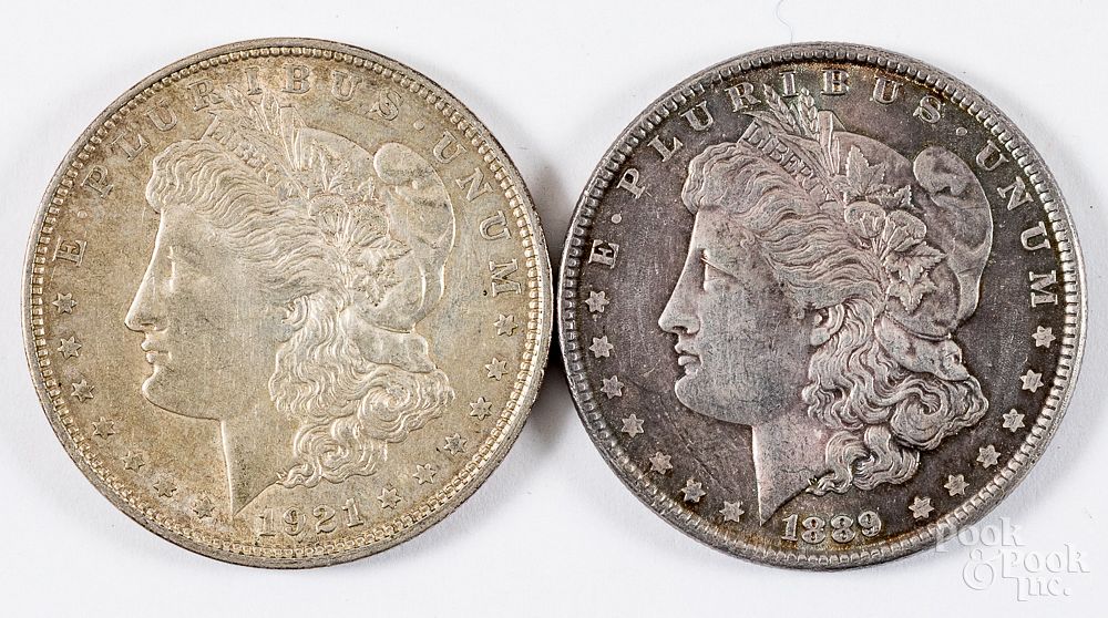 Appraisal: Two Morgan silver dollars -D and Two Morgan silver dollars