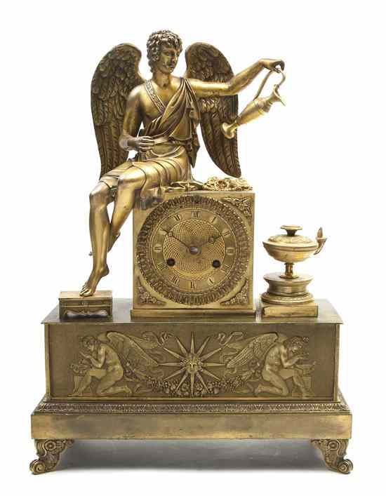 Appraisal: A French Gilt Bronze Figural Mantel Clock surmounted by a