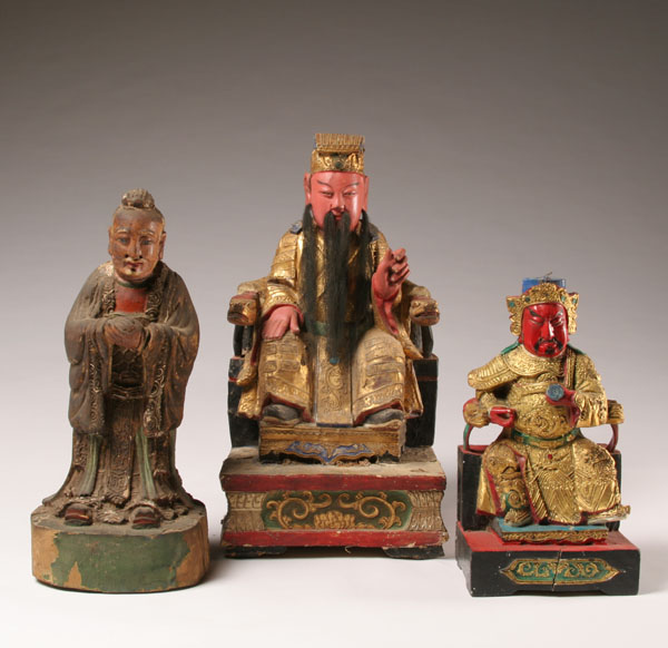 Appraisal: Chinese wooden temple figures gessoed paint and gilt decoration elaborate