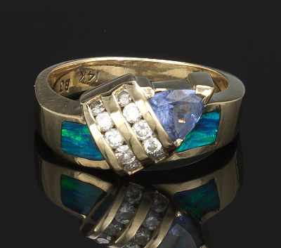 Appraisal: A Ladies' Opal Diamonds and Tanzanite k yellow gold ring