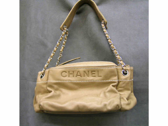 Appraisal: Chanel handbag mocha leather zippered compartment handbag two side compartments