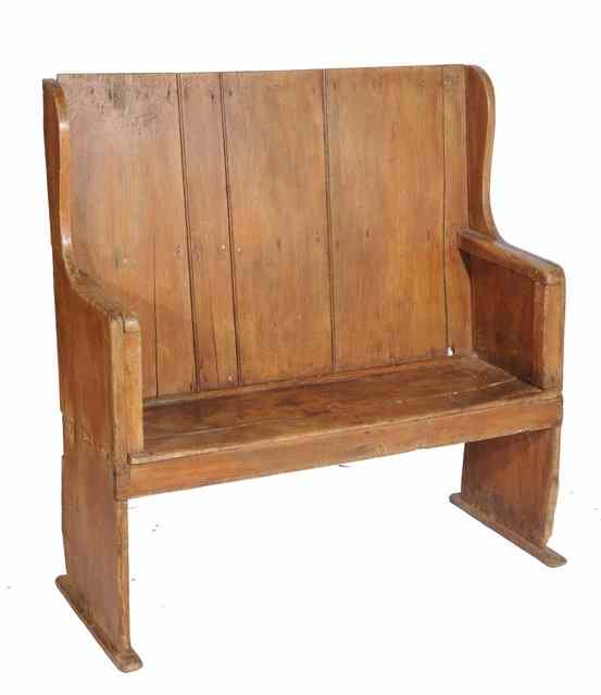 Appraisal: A WELSH PINE SETTLE with high wing back wide