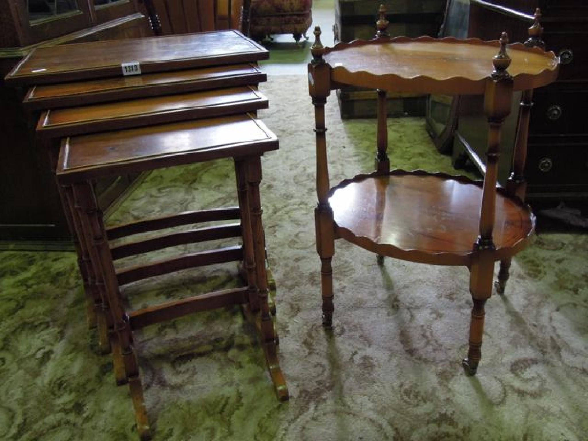 Appraisal: A quartetto nest of yew wood veneered graduated occasional tables