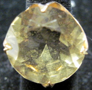 Appraisal: Yellow gold smokey quartz rings ingle round shaped quartz in