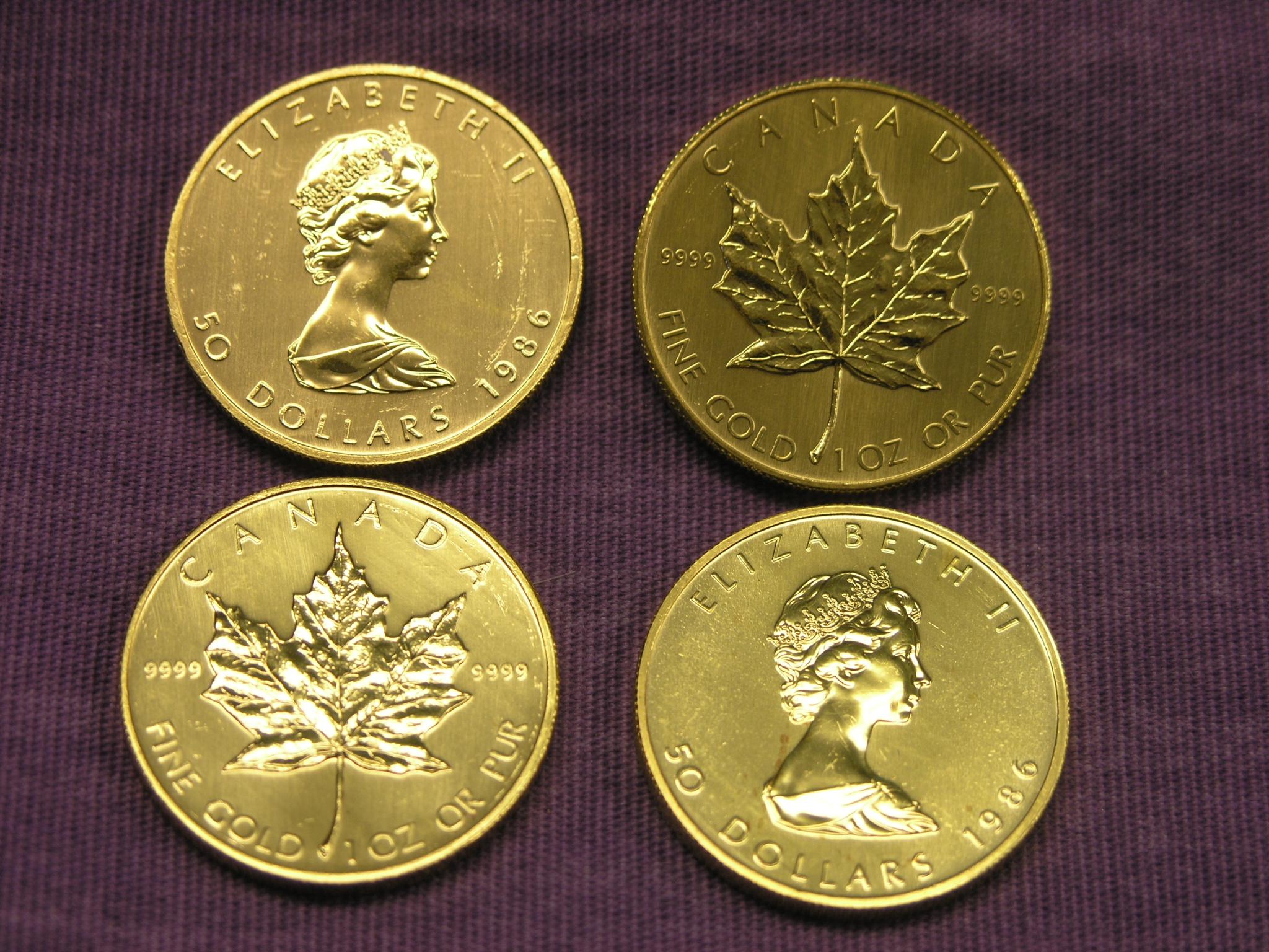 Appraisal: Four Canadian Dollars gold coins