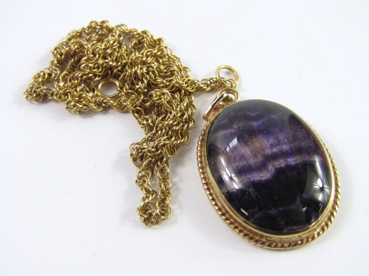 Appraisal: A Blue John pendant mounted in ct yellow gold set