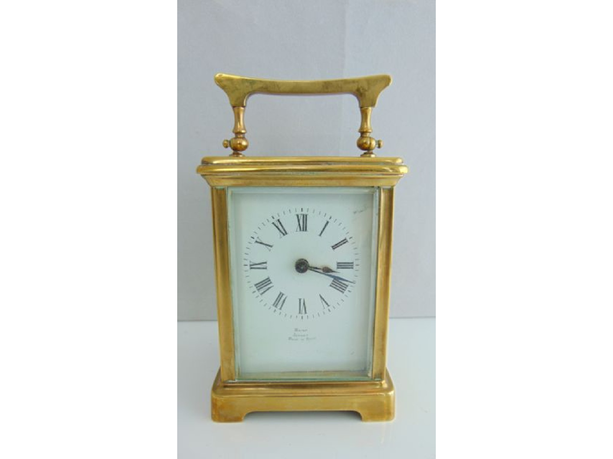 Appraisal: A simple French carriage clock retailed by Maine of Jersey