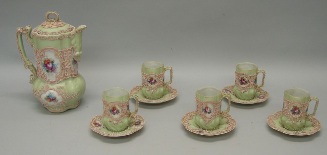 Appraisal: Service includes teapot and cups and saucers hand painted floral