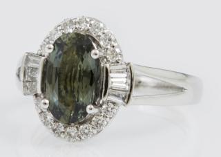 Appraisal: Lady's K Platinum Dinner Ring with an oval carat green