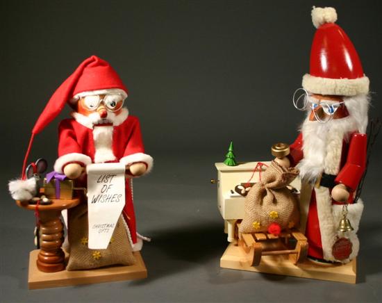 Appraisal: Two Steinbach musical Santa Claus nutcrackers Germany Carved wood tagged