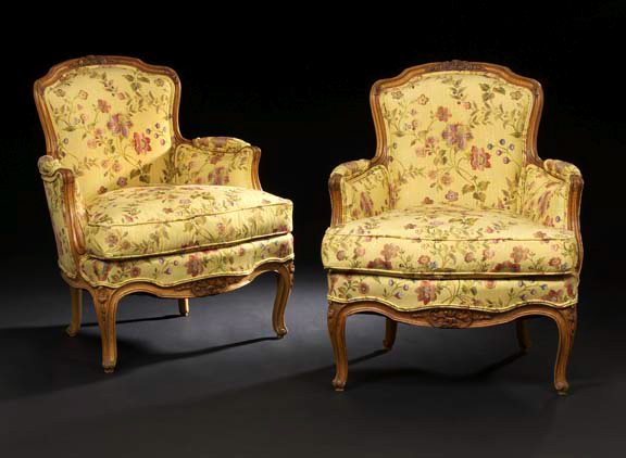 Appraisal: Pair of Louis XV-Style Carved Fruitwood Bergeres late th century