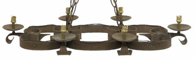 Appraisal: Gothic style wrought iron chandelier early th c curved frame