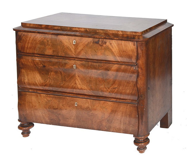 Appraisal: A BIEDERMEIER MAHOGANY CHEST of three long drawers with caddy