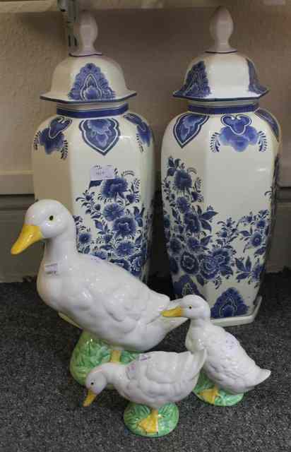 Appraisal: A PAIR OF DELFTWARE blue and white lidded jars of