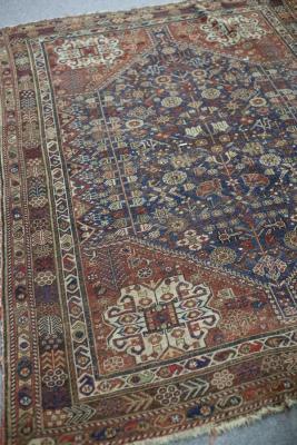 Appraisal: A Hamadan rug with central blue ground geometric field and